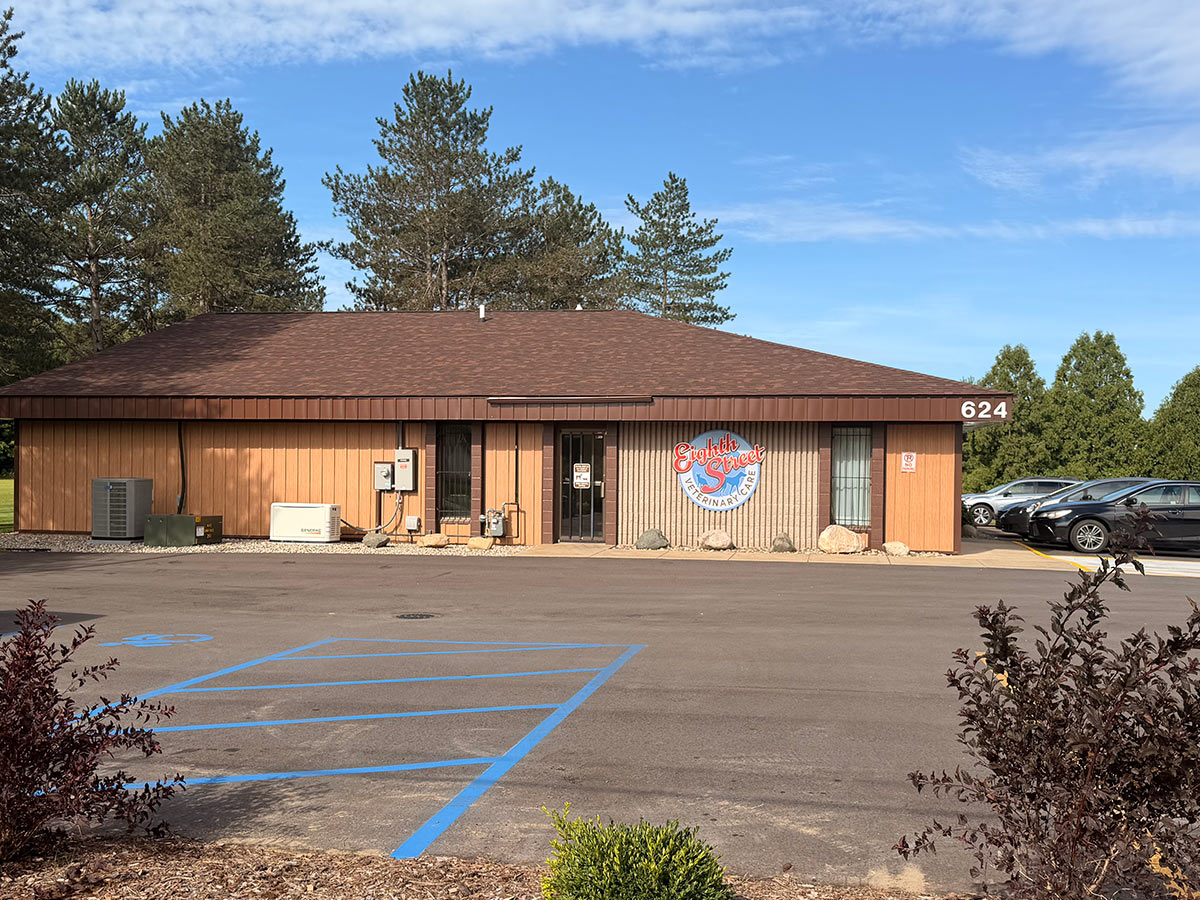 Exterior of Eighth Street Veterinary Care with the clinic sign and parking lot